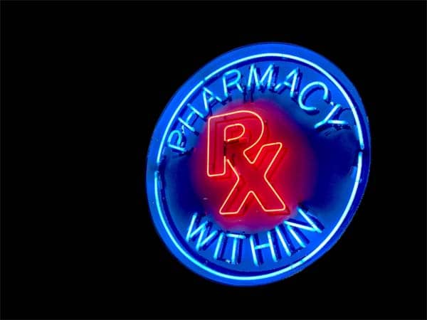 pharmacy within neon sign